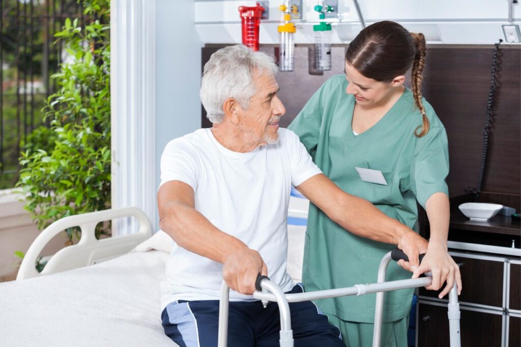 Elderly being taken care of by a Personal Care assistant.