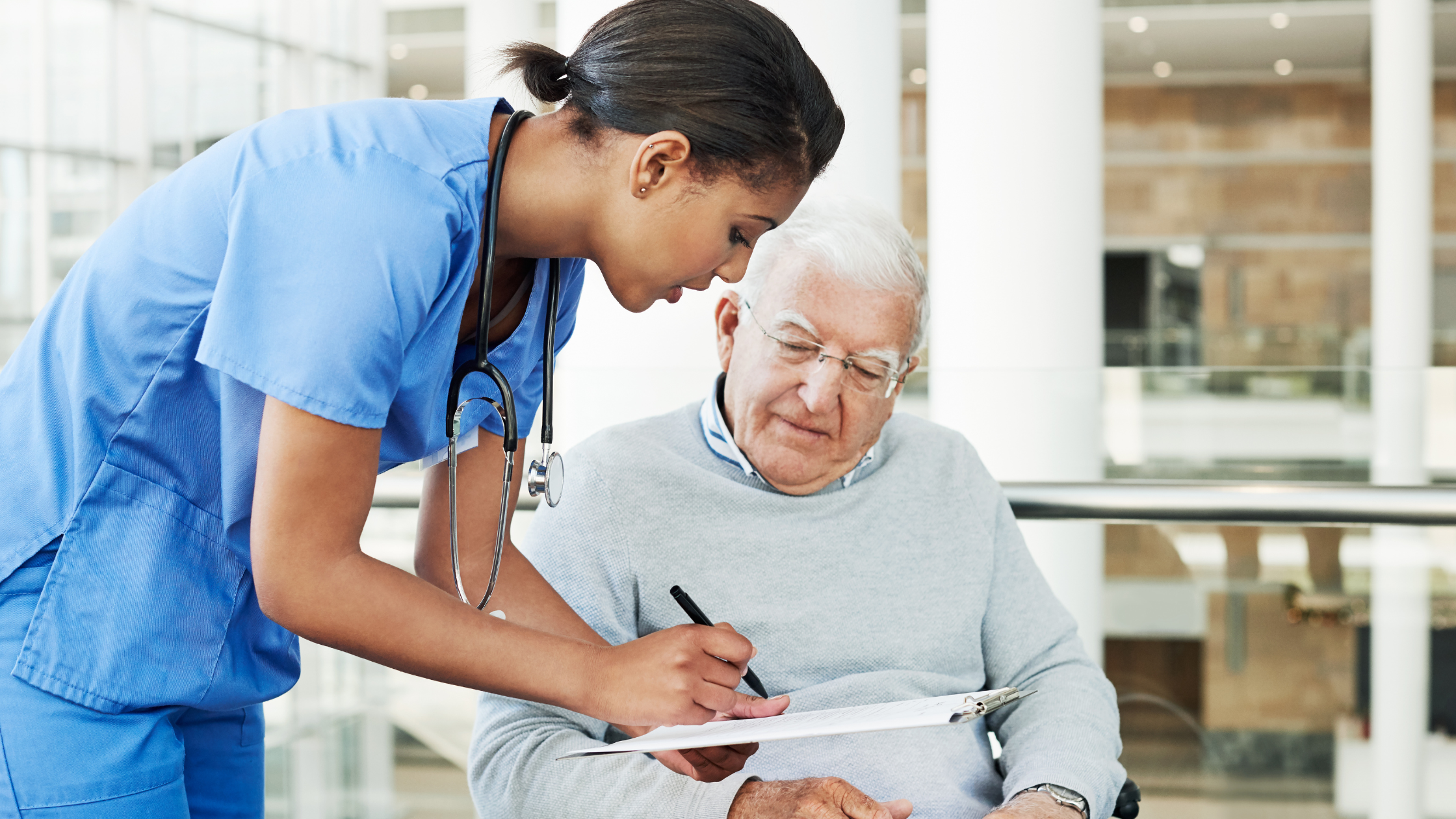 Skilled nurse providing in-home care and checking vital signs for an older adult